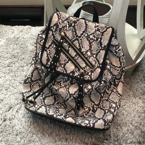 NWOT NEUTRAL SNAKE PRINT BACKPACK